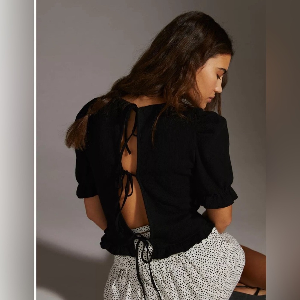 NWOT Anthropologie black puffy sleeve tie back top